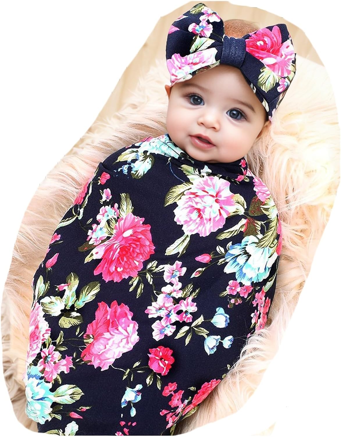 Baby girl wrapped in a navy blue rose swaddle blanket
